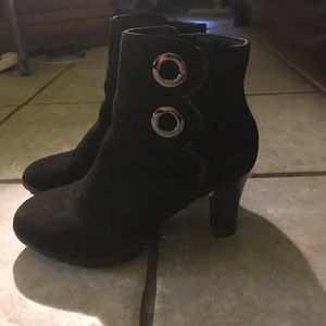 Black high heel booties.