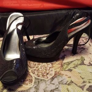 Black sequined high heels
