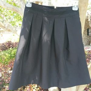 Black house white market pleated midi skirt