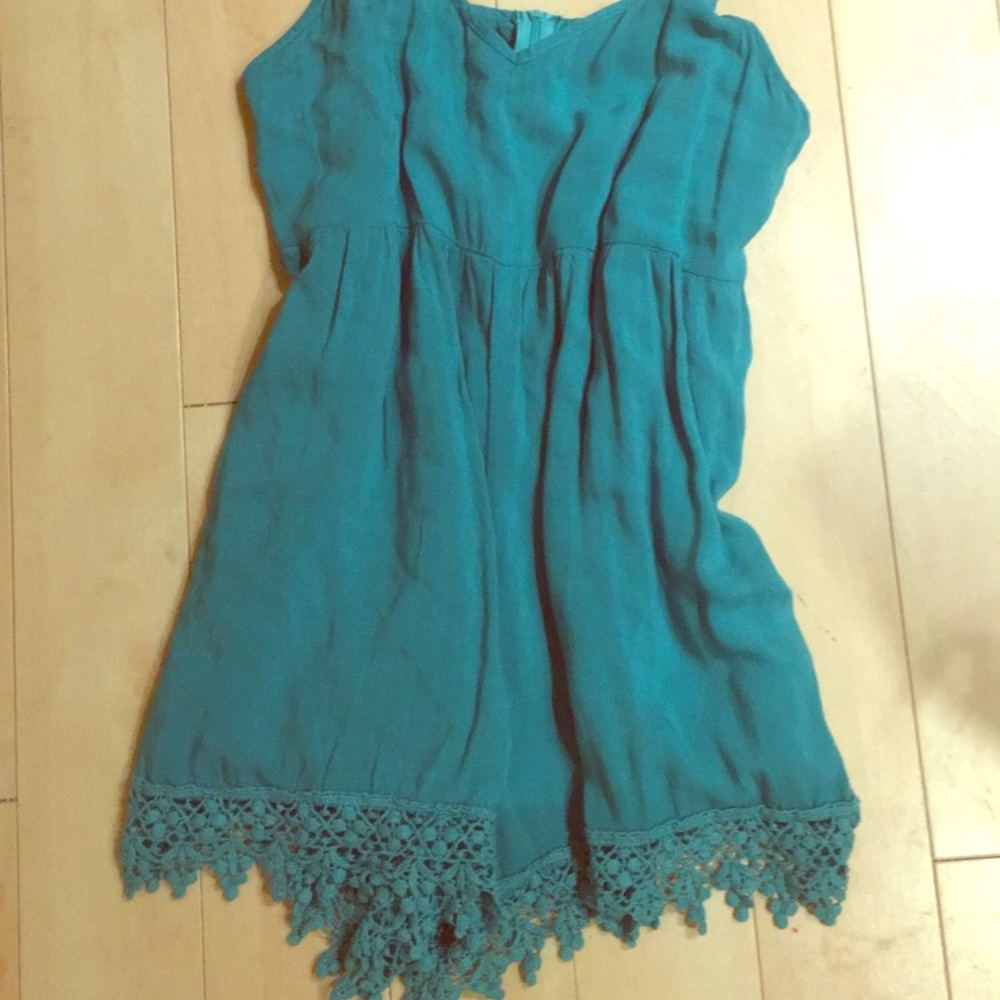 Adorable green Tobi romper