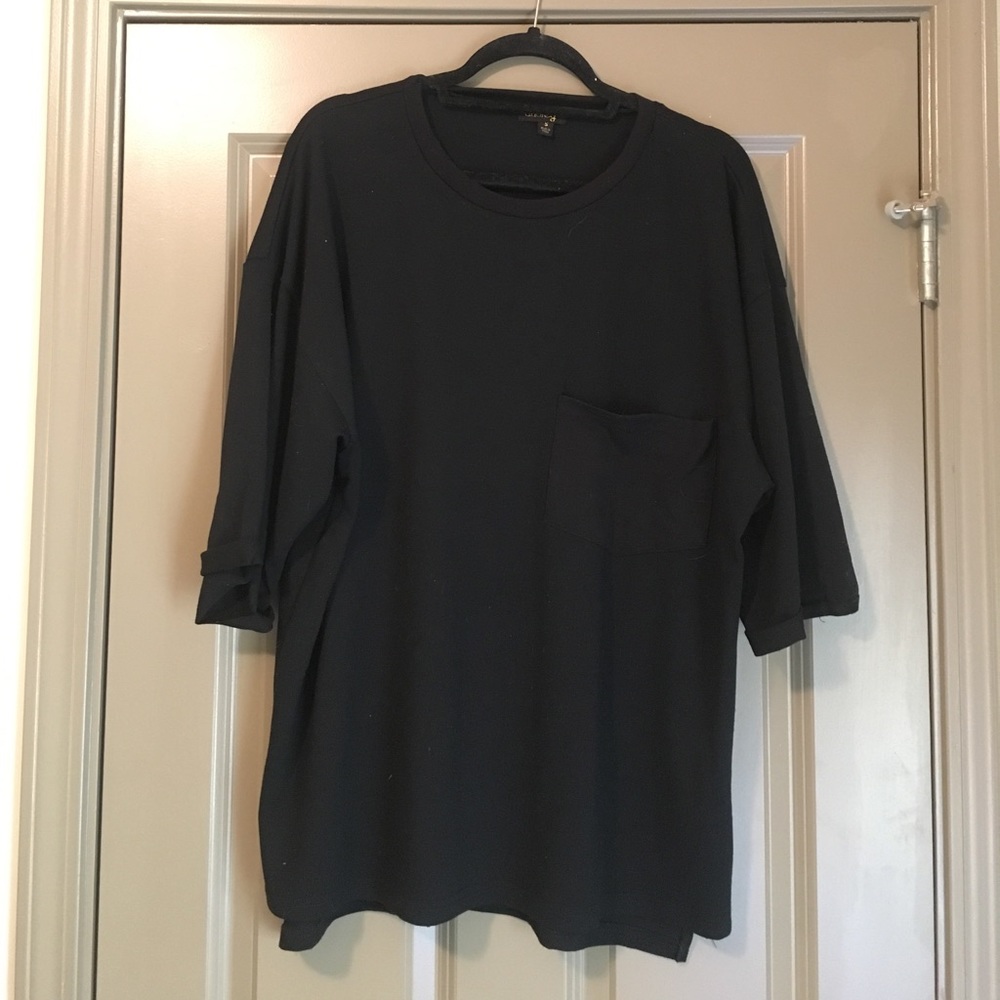 Oversized black tunic with pocket
