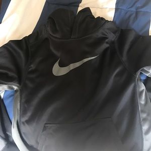 A Nike youth large black and gray hoodie