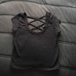 black t shirt, cross in the back