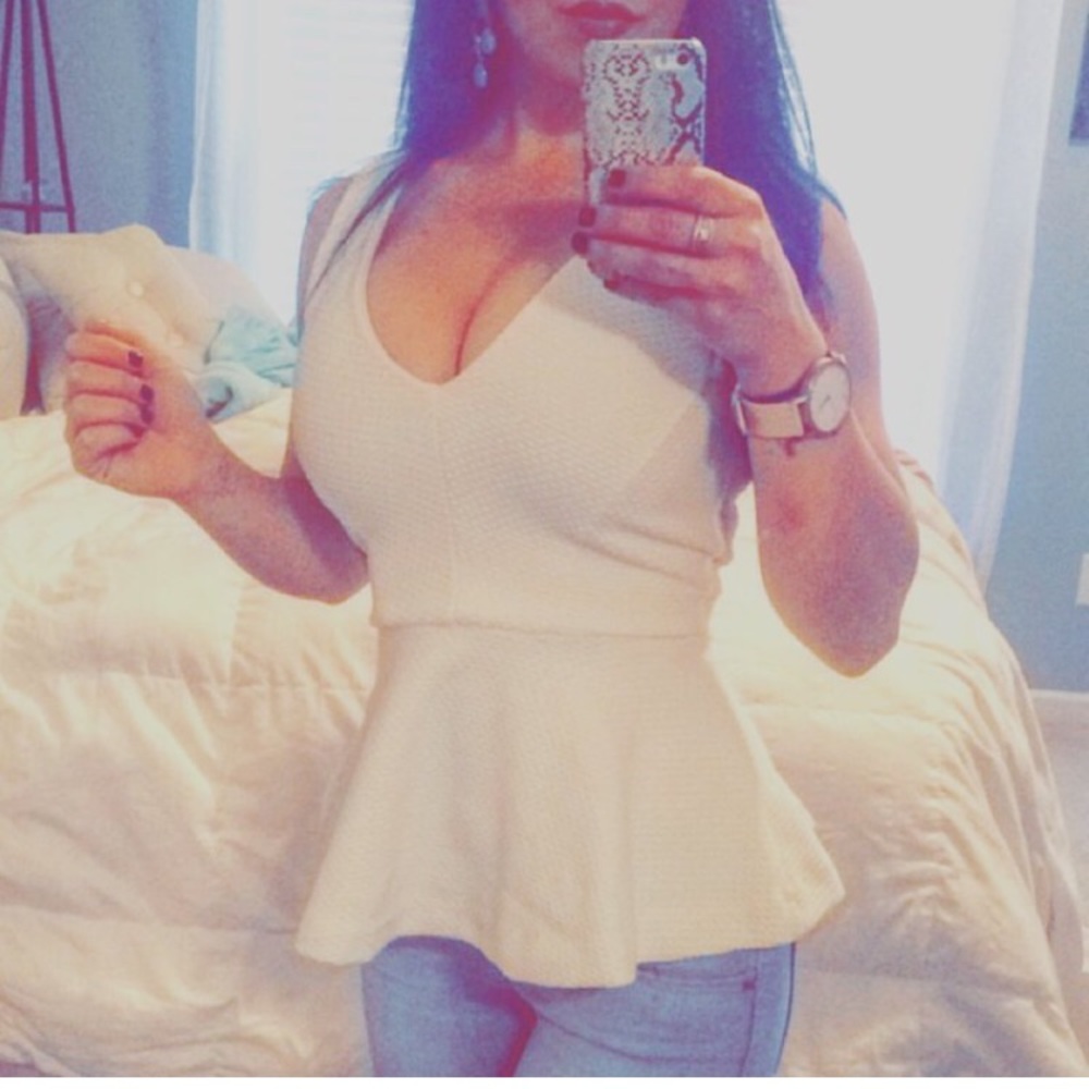 White sleeveless blouse