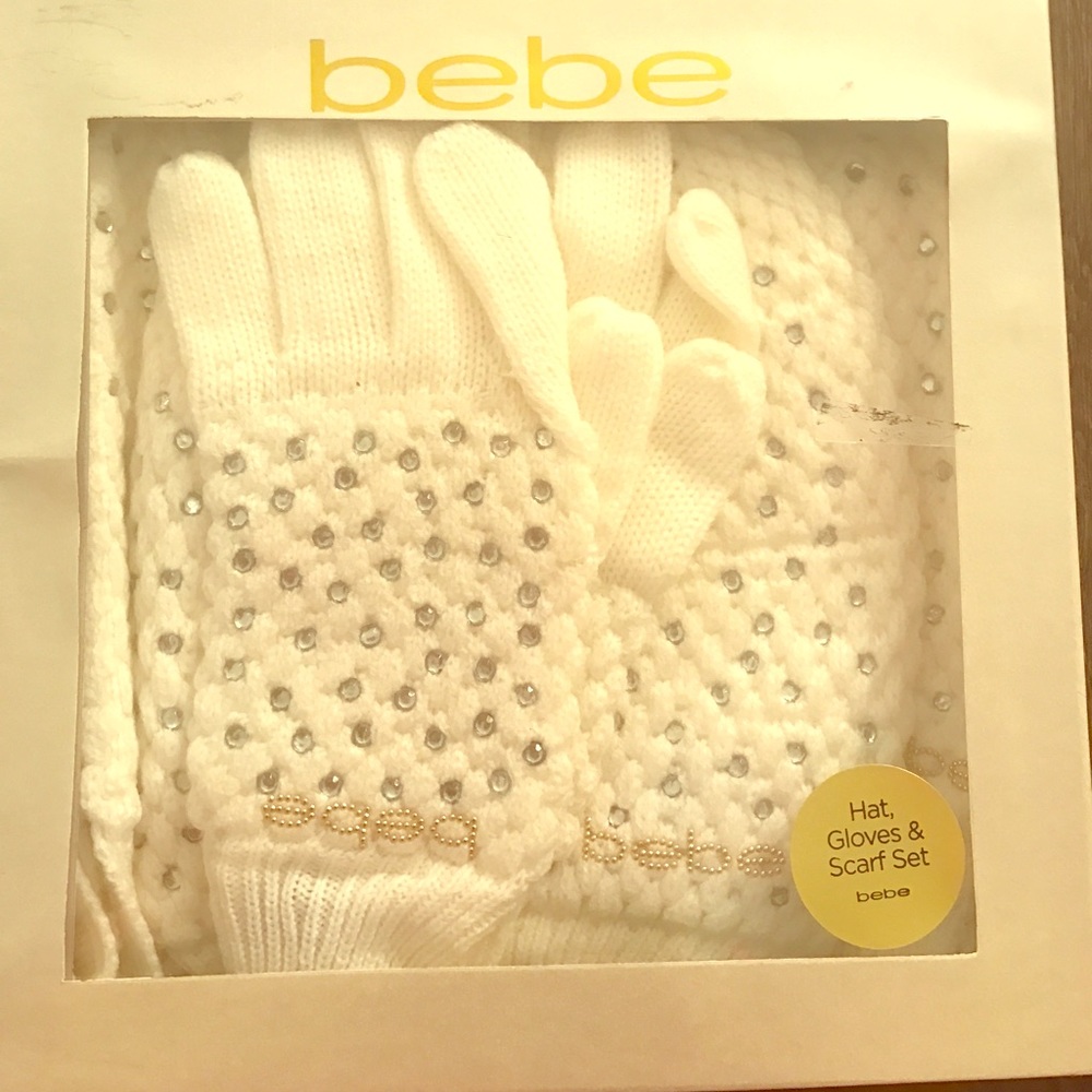 Brand new hat, gloves, and scarf set from bebe.