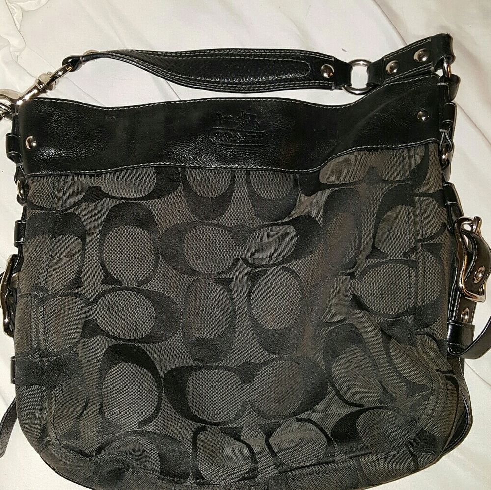 Black traditional coach bag