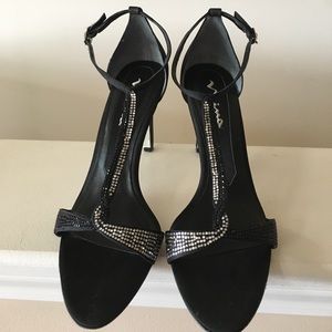 Nina black and silver rhinestone embossed heels.