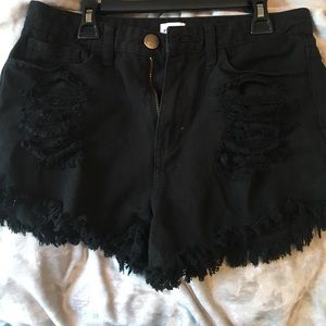 High waisted black ripped shorts