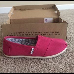 Brand new pink toms