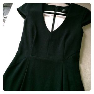 Black cap sleeve cocktail dress