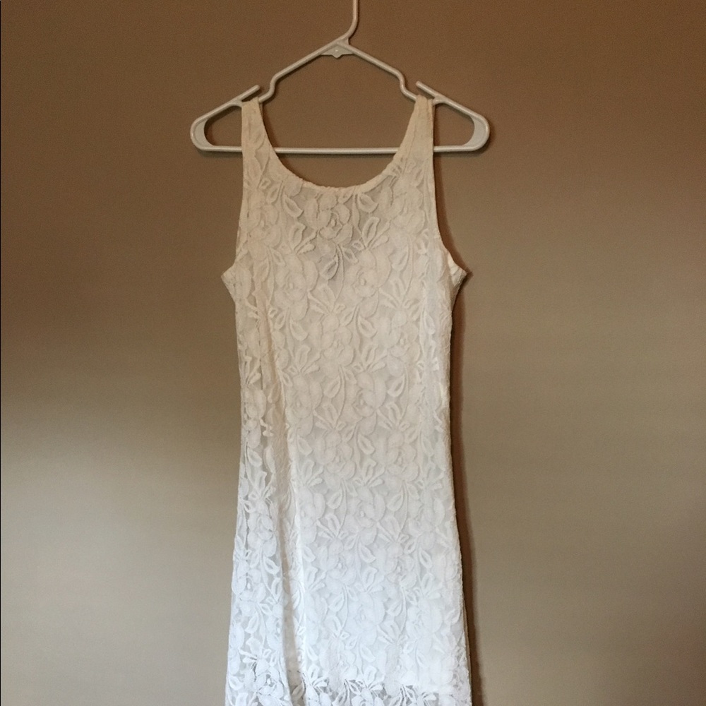 Summery white lacey white dress with uneven hem