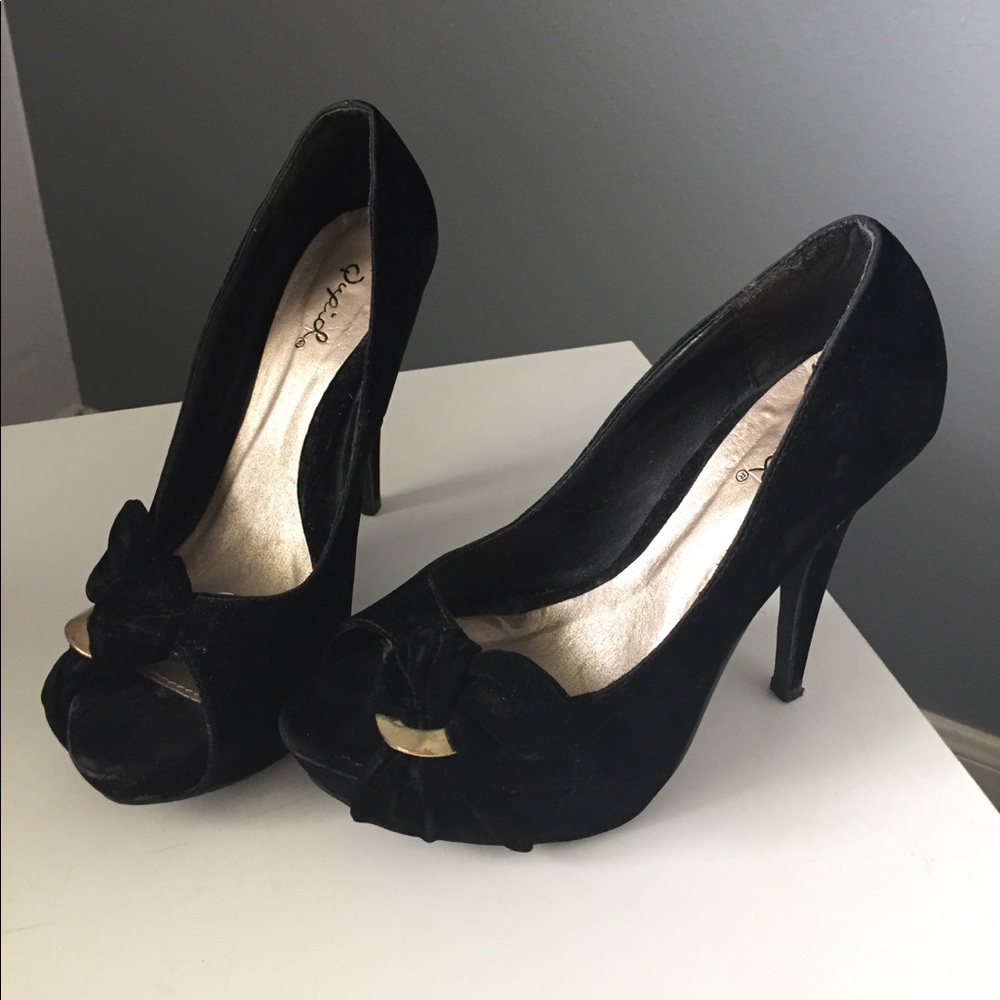 Black velvet high heels with gold accent