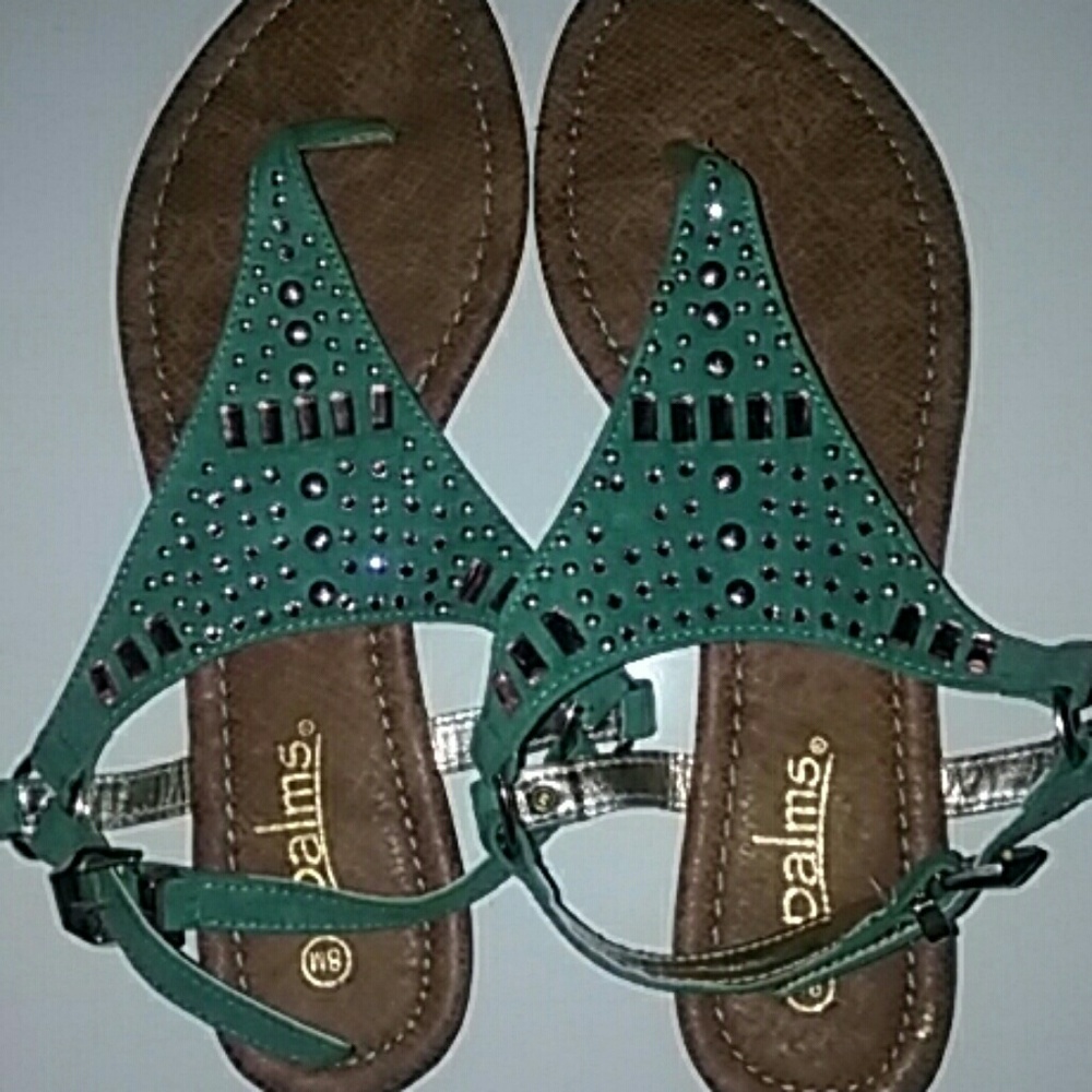 Palms sandles  tur in color with crystals on top