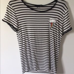 Simple stripped tee with a fun patch.