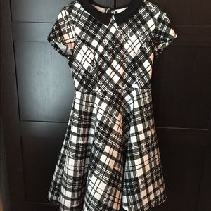 Black and white dress with Peter Pan collar.