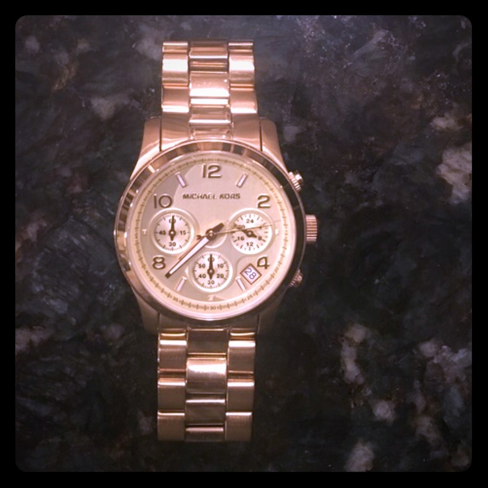 Michael Kors large gold tone watch -excellent cond