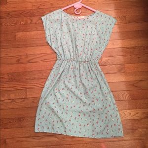 Light blue, floral dress, with lace back.