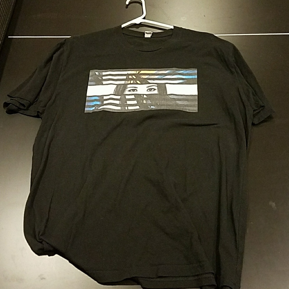 NextLevel Tee