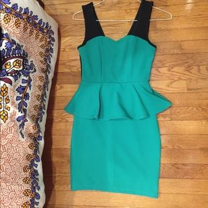 Black, turquoise peplum dress.