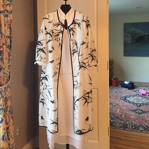 Two piece sleeveless midi dress with jacket