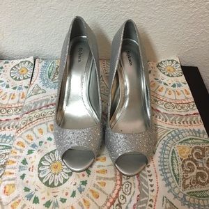 Pre-Loved Silver Heels.