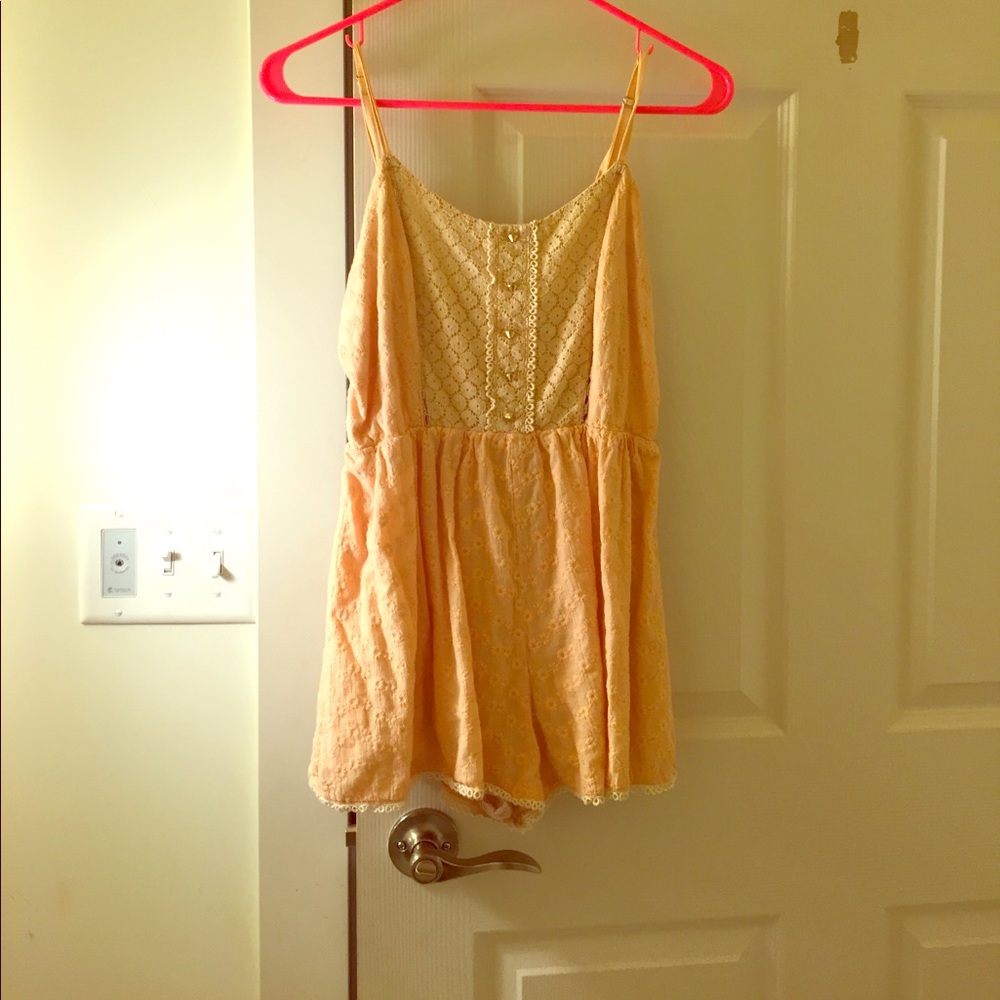 Salmon romper with front buttons
