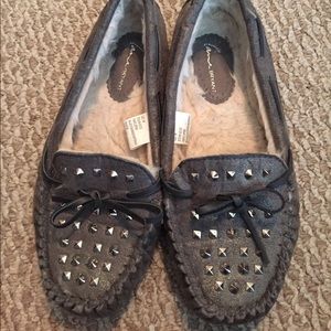 Silver faux fur lined moccasins.