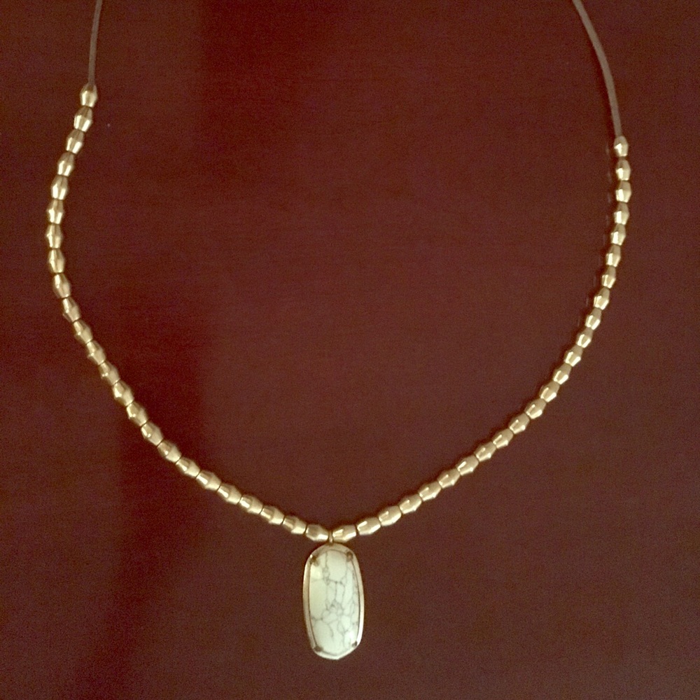 Long beaded pendant necklace