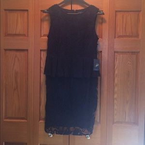 Peplum lace sheath dress. Navy blue