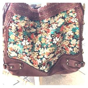 Floral print with leather detail. Like brand new.
