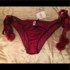 Red bikini style xmas panties with fluff balls