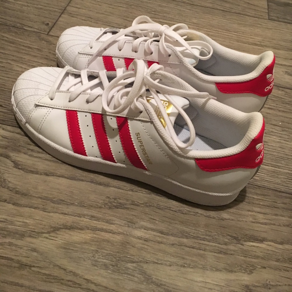 Red and white superstar adidas