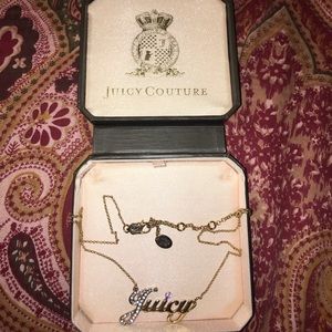 juicy couture gold " juicy" necklace.