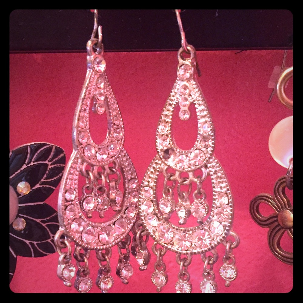 Silver earrings.