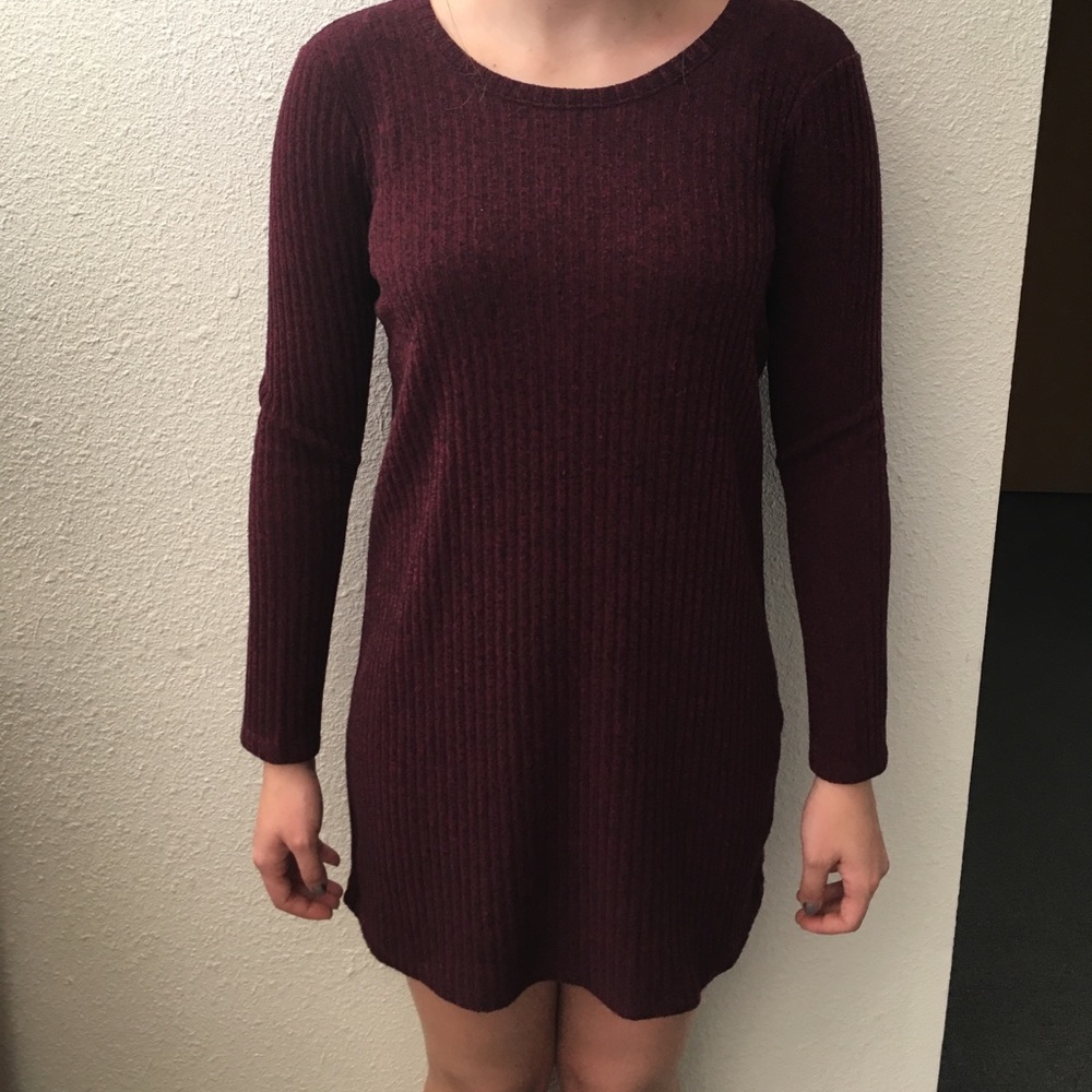 Mid thigh length red dress.