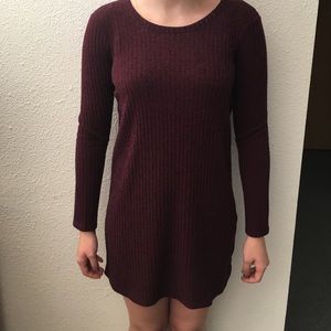 Mid thigh length red dress.