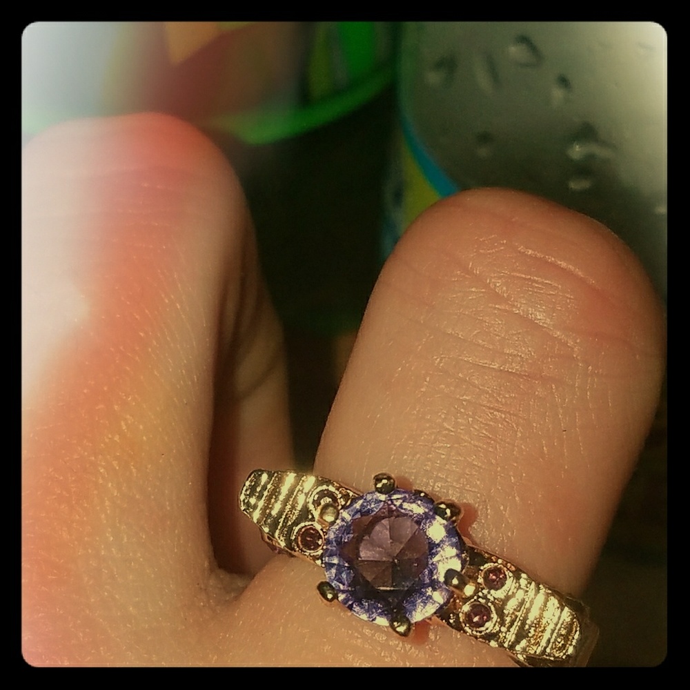 Amethyst skull with wings ring