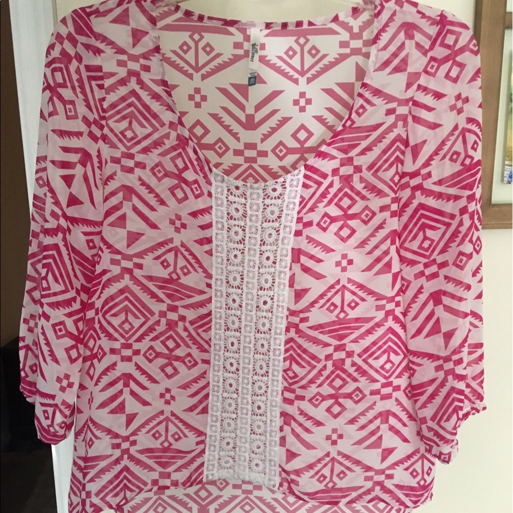 Pink and white patterned shirt