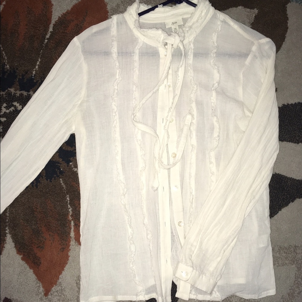 blouse with tie at neck and ruffles