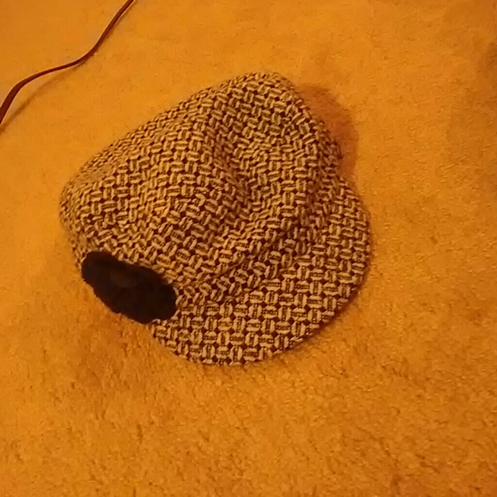 Patterned hat with flower