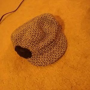 Patterned hat with flower