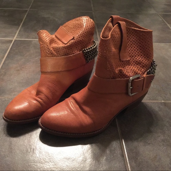 BCBGeneration Shoes - BCBG booties with chain and perforated detail