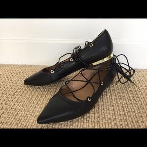 Black pencil toe flats