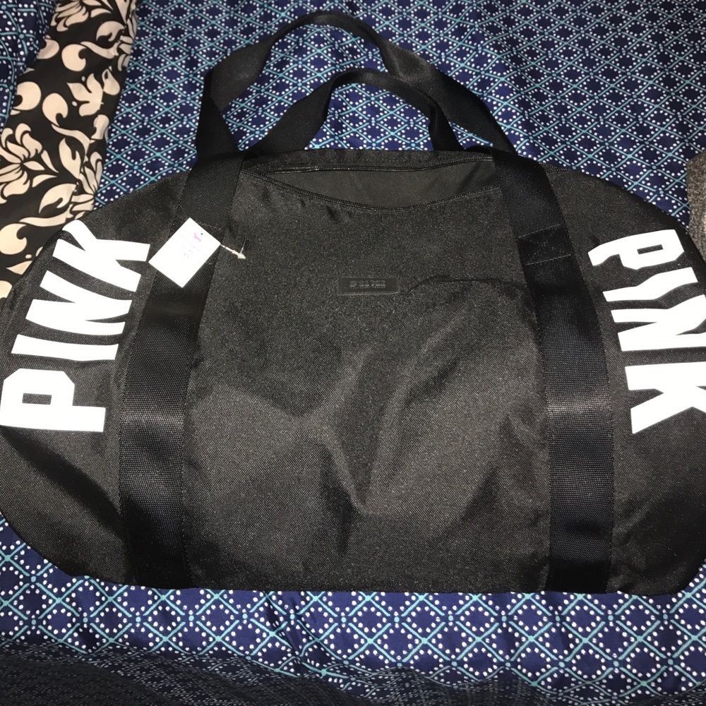 Pink VS black duffle bag