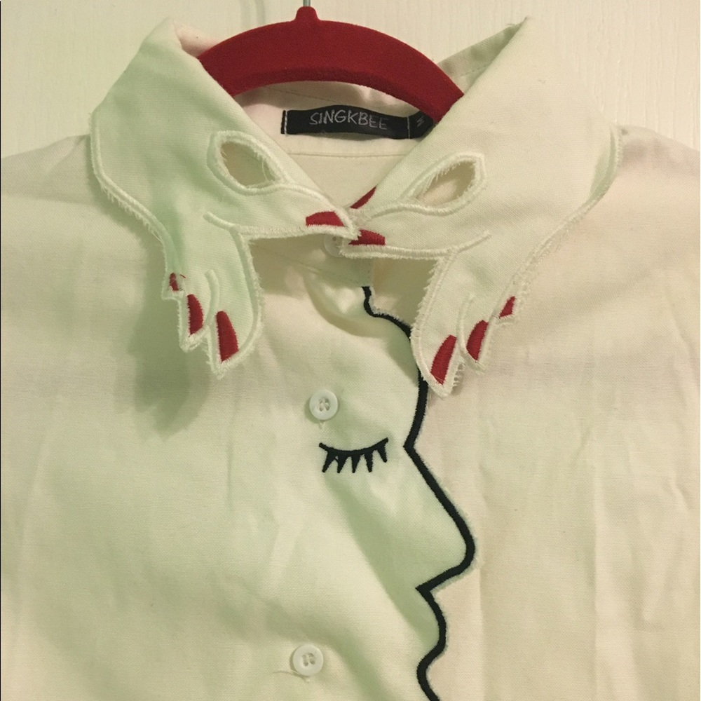 Cool artsy no brand fingers and faces shirt