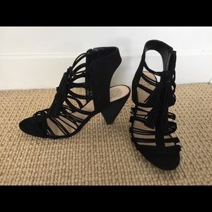 Black  heels with tassels.