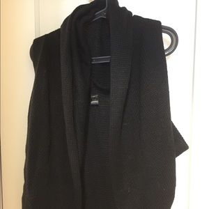 (Unknown brand) black cowl neck sweater vest.