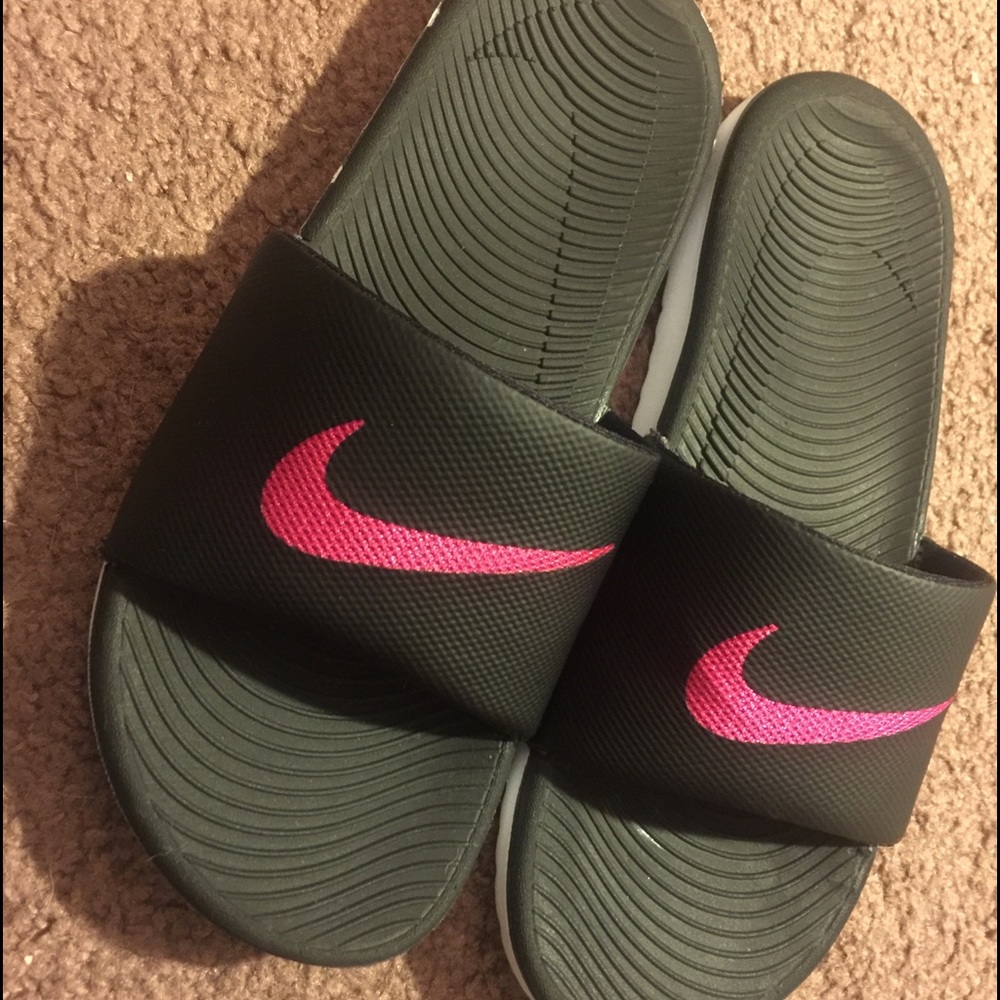 like new Nike slip on sandals