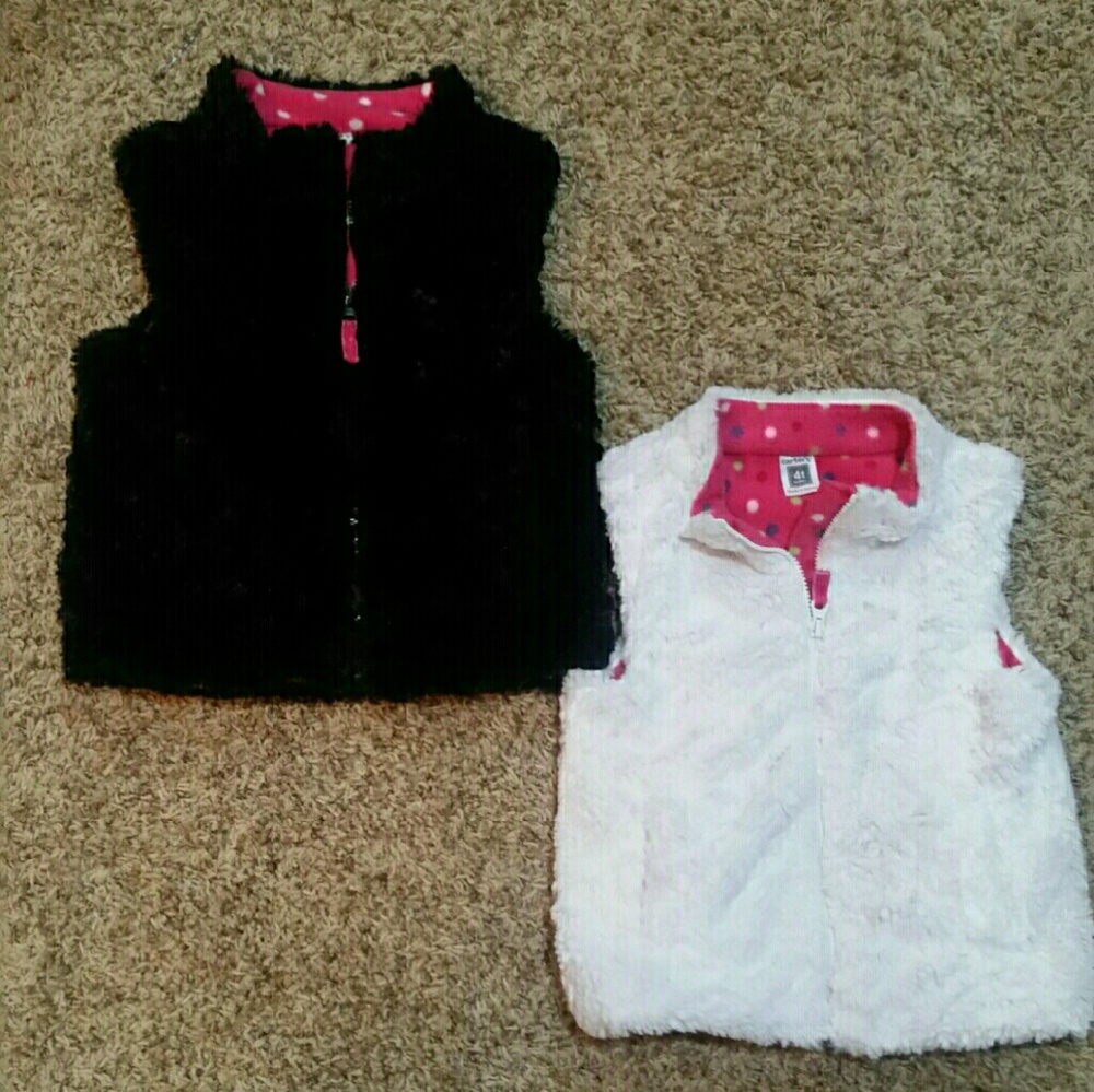 2 for $10. 2- soft and fuzzy reversible vests