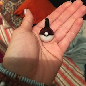Glass poke ball pendant